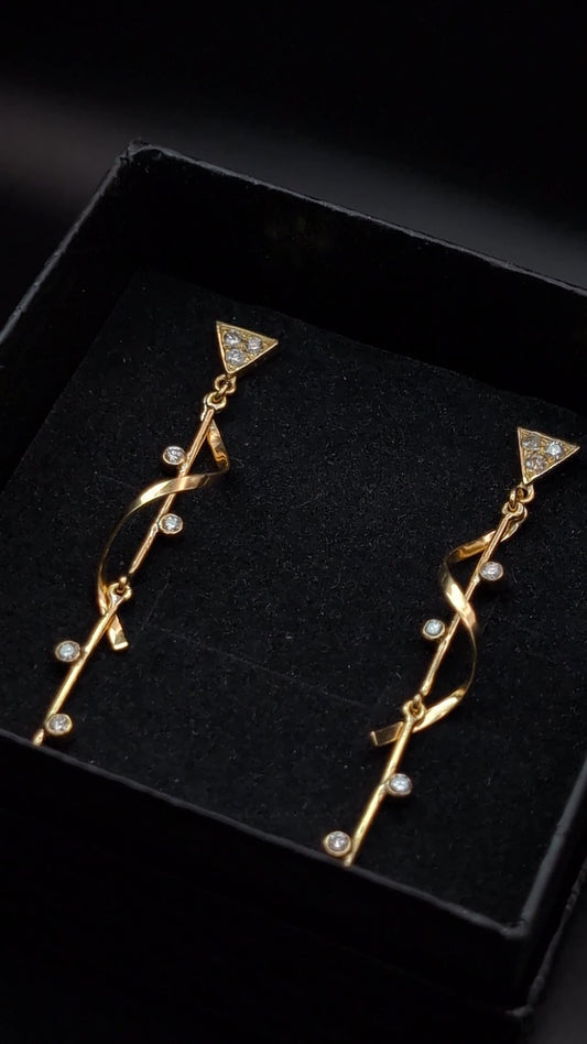 Pendientes largos · Oro 18k y Diamantes